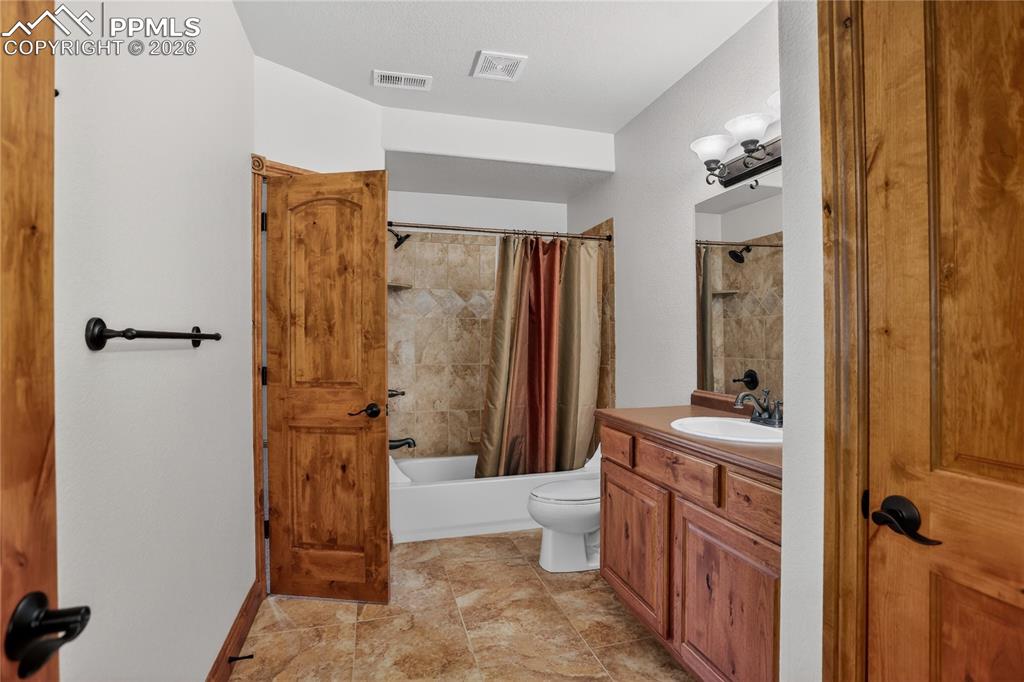 Image 26 of 33: Full guest bath - lower level