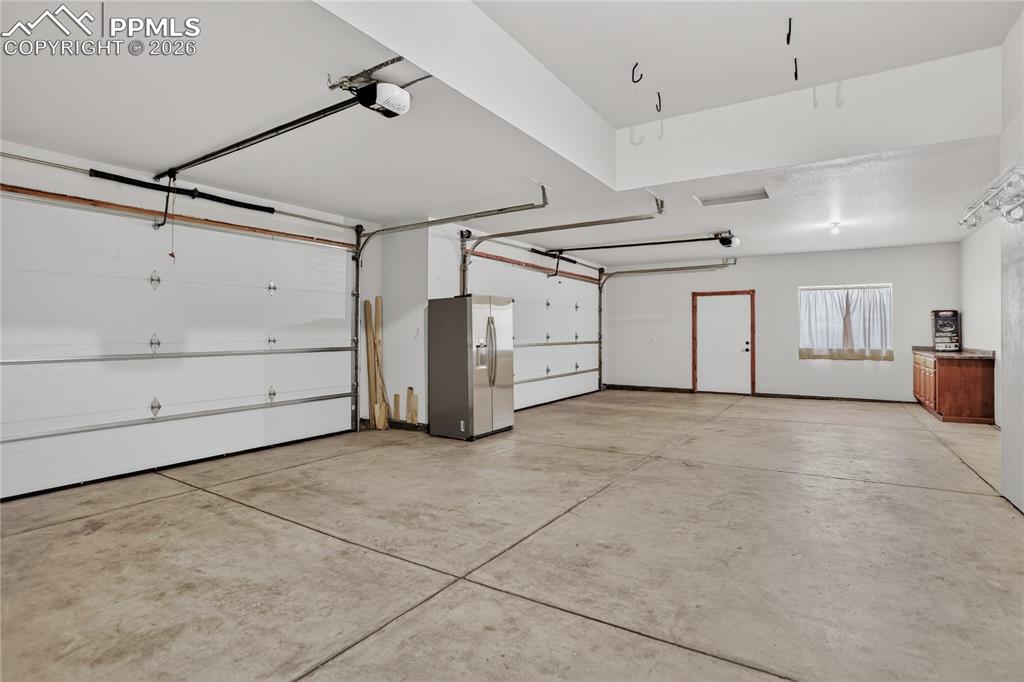 Image 29 of 33: Finished 4-car garage