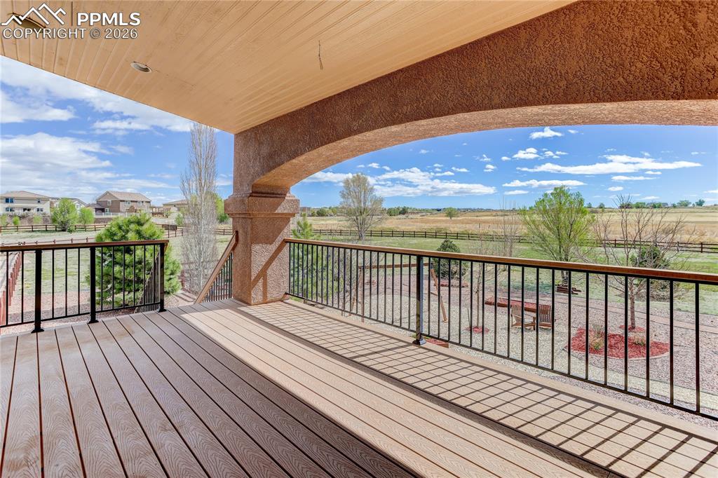 Image 9 of 33: Covered Trex deck