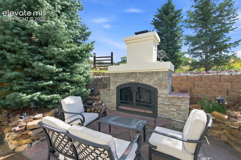 Image 19 of 48: Outdoor Fireplace