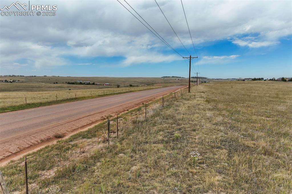 Image 14 of 19: View of street with a rural view