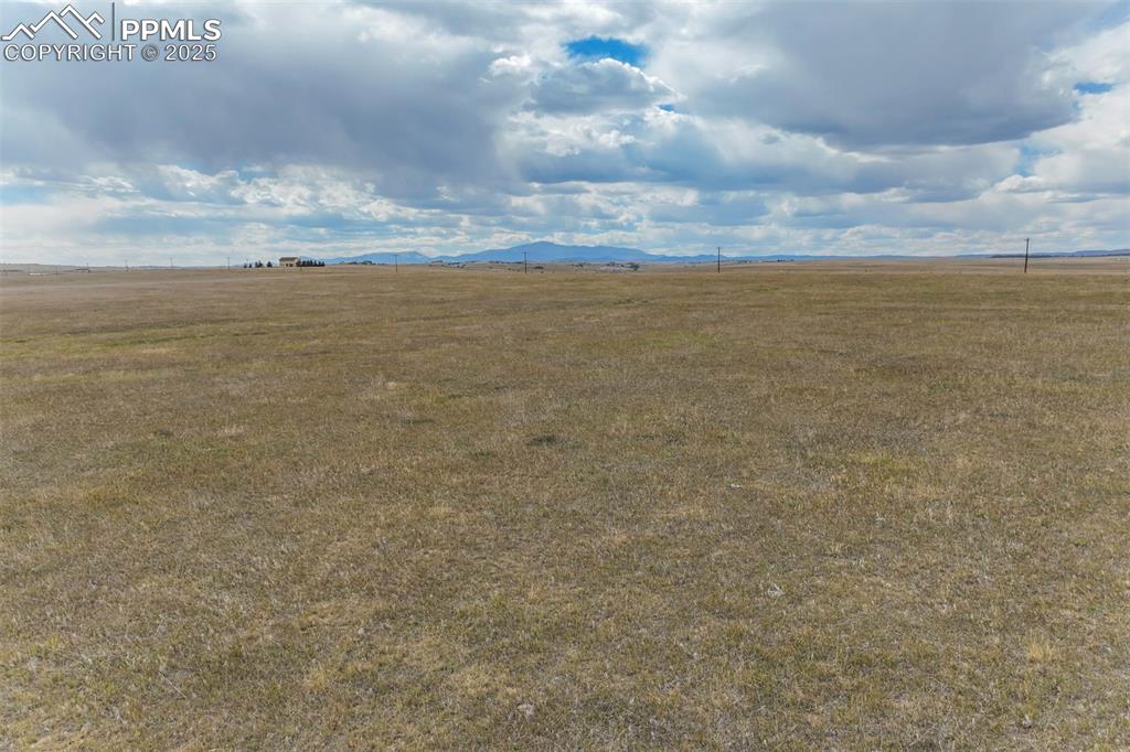 Image 18 of 19: Property view of mountains featuring a rural view