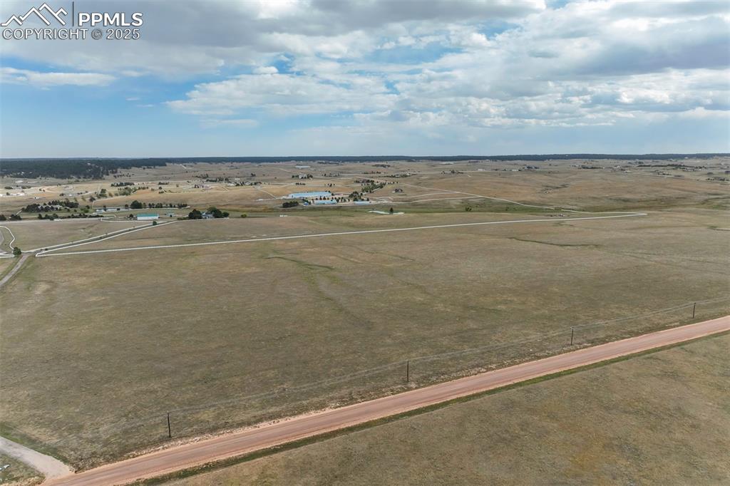 Image 3 of 19: Birds eye view of property with a rural view