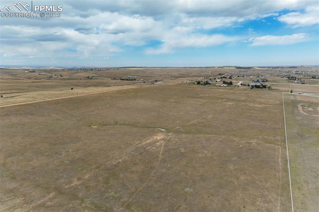 Image 9 of 19: Aerial view featuring a rural view