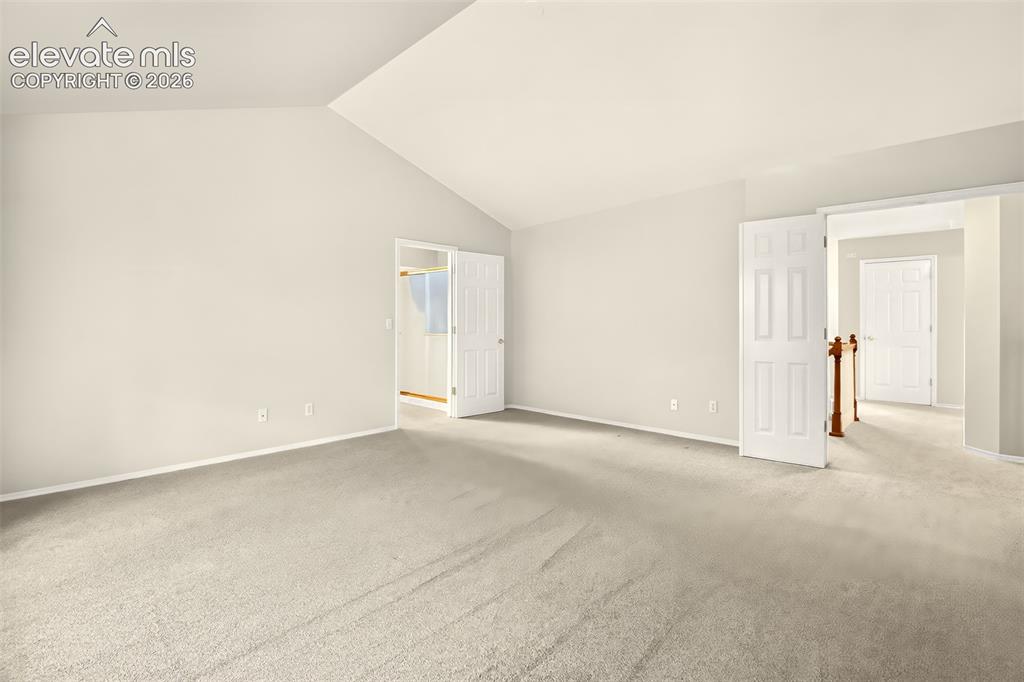Image 28 of 42: Vaulted Ceiling In Master