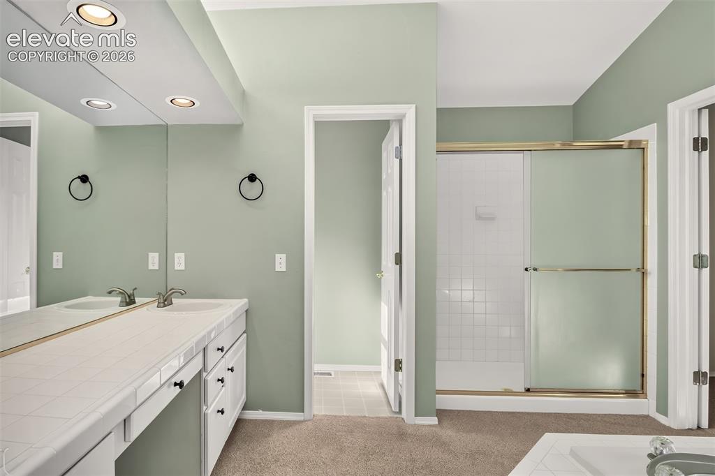 Image 30 of 42: Master shower, walk-in closet not pictured.