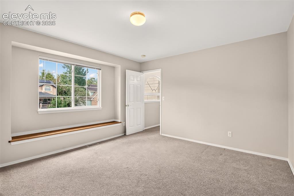 Image 31 of 42: Guest bedroom (Note: 4 upstairs bedrooms including the master, 5th bedroom 