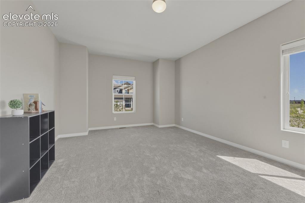 Image 6 of 42: Large Bedroom on Main Floor