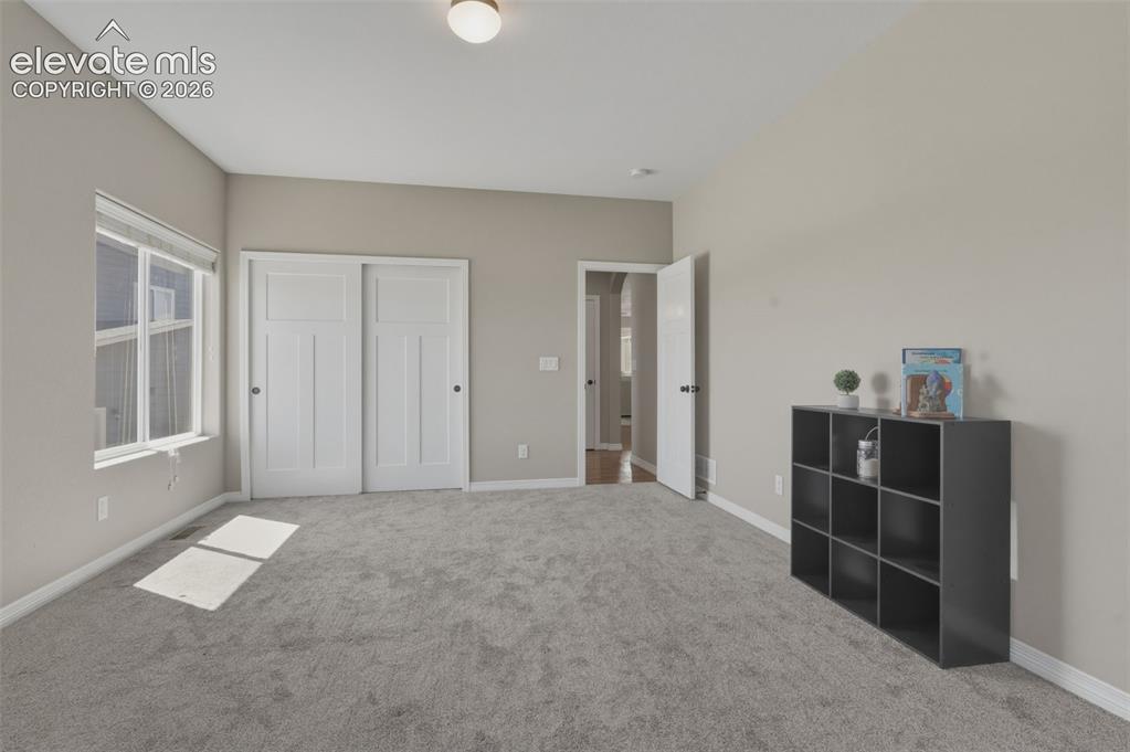 Image 7 of 42: Large Bedroom on Main Floor