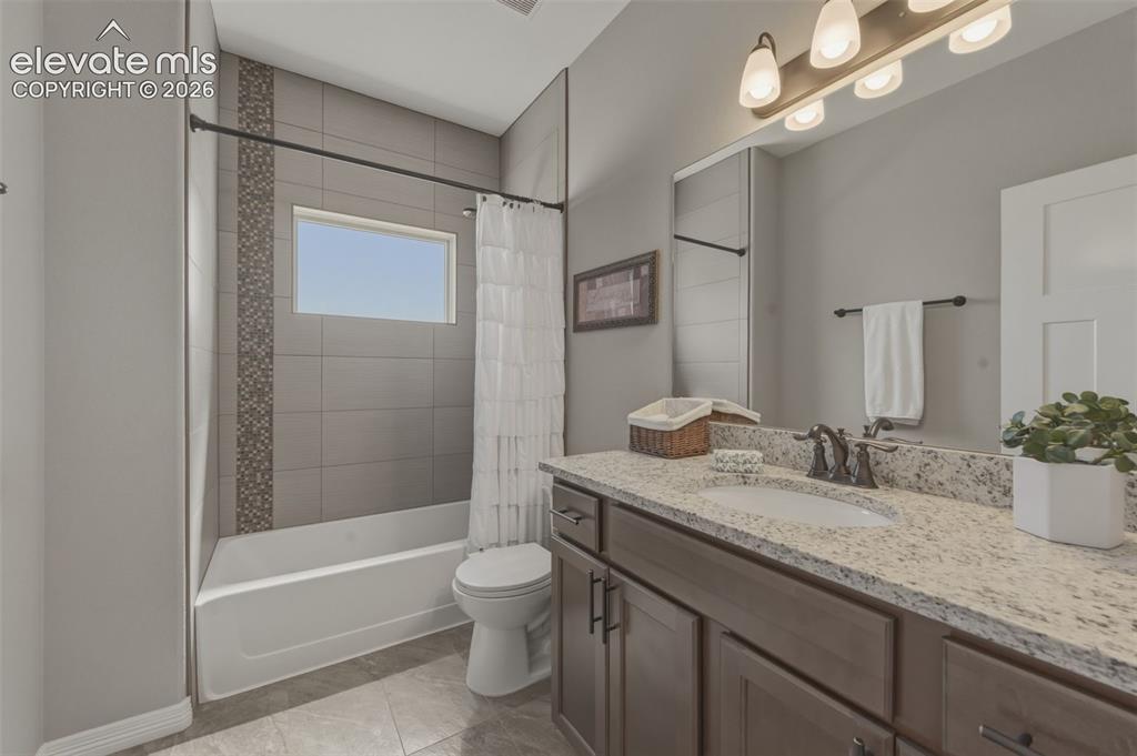 Image 8 of 42: Full Bath next to Bedroom on Main Floor