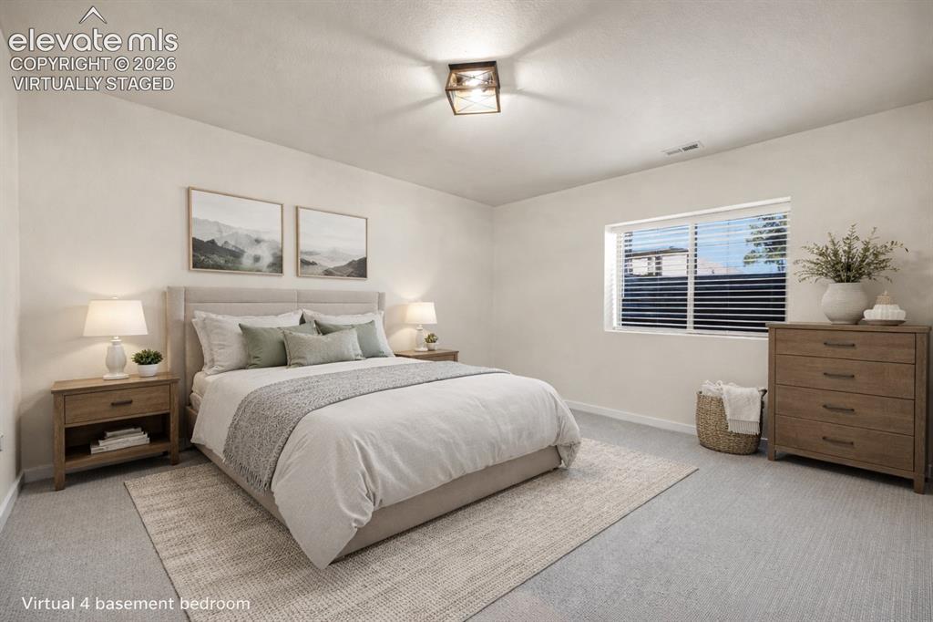 Image 9 of 48: virtually staged. Recessed window with blinds, light-toned carpeting, flush