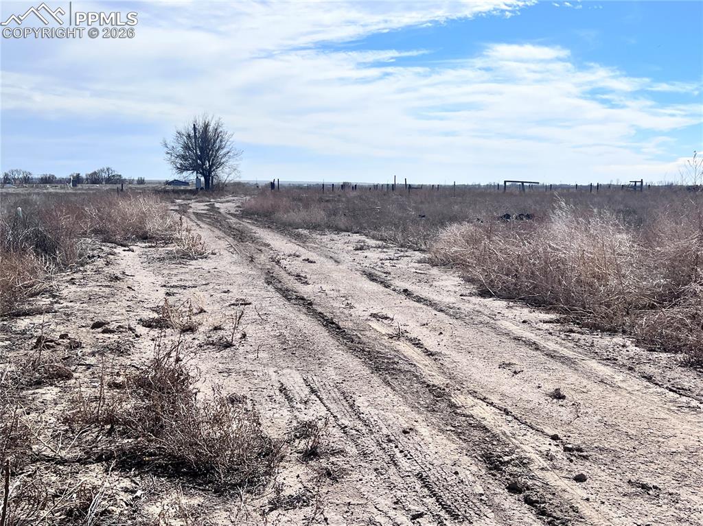 Image 19 of 33: The property offers views of a body of water under a bright sky with scatte