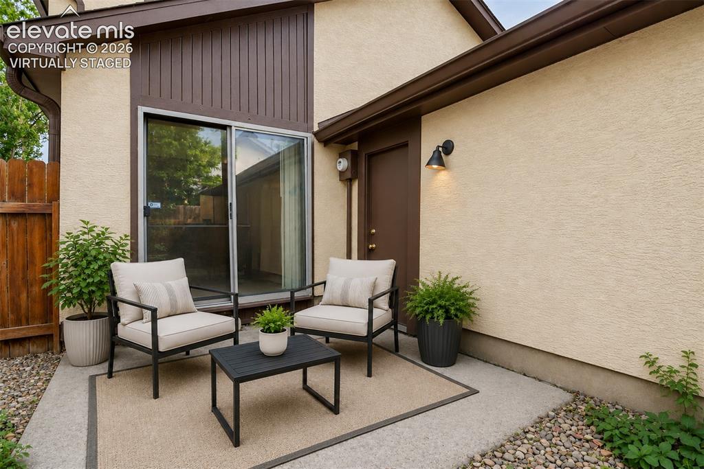Image 18 of 38: Virtually Staged 
Patio off Kithcen