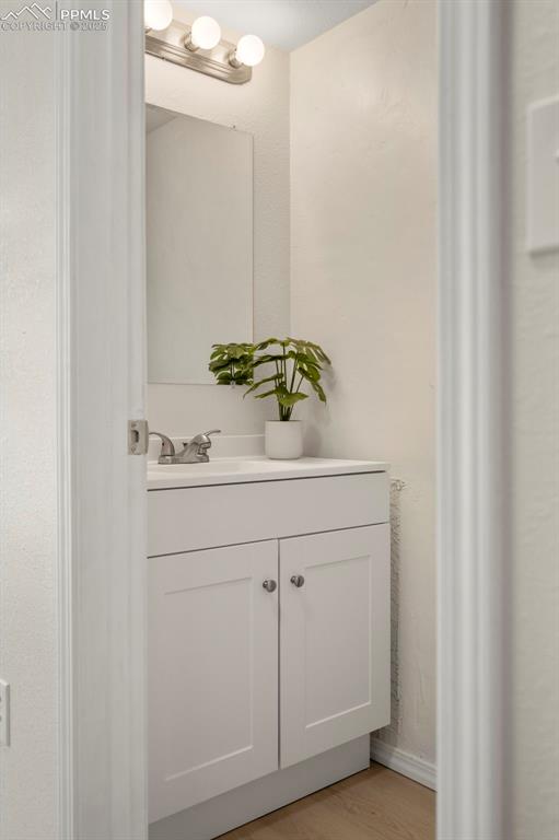 Image 13 of 41: Downstairs half bath