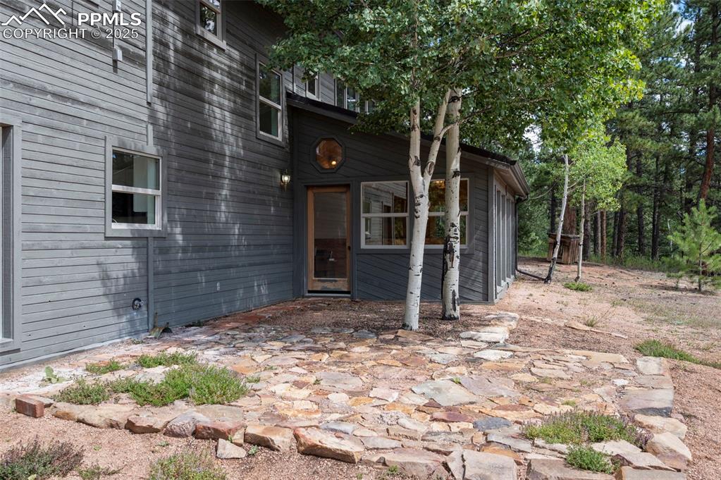 Image 3 of 42: Flagstone patio off of the dining area