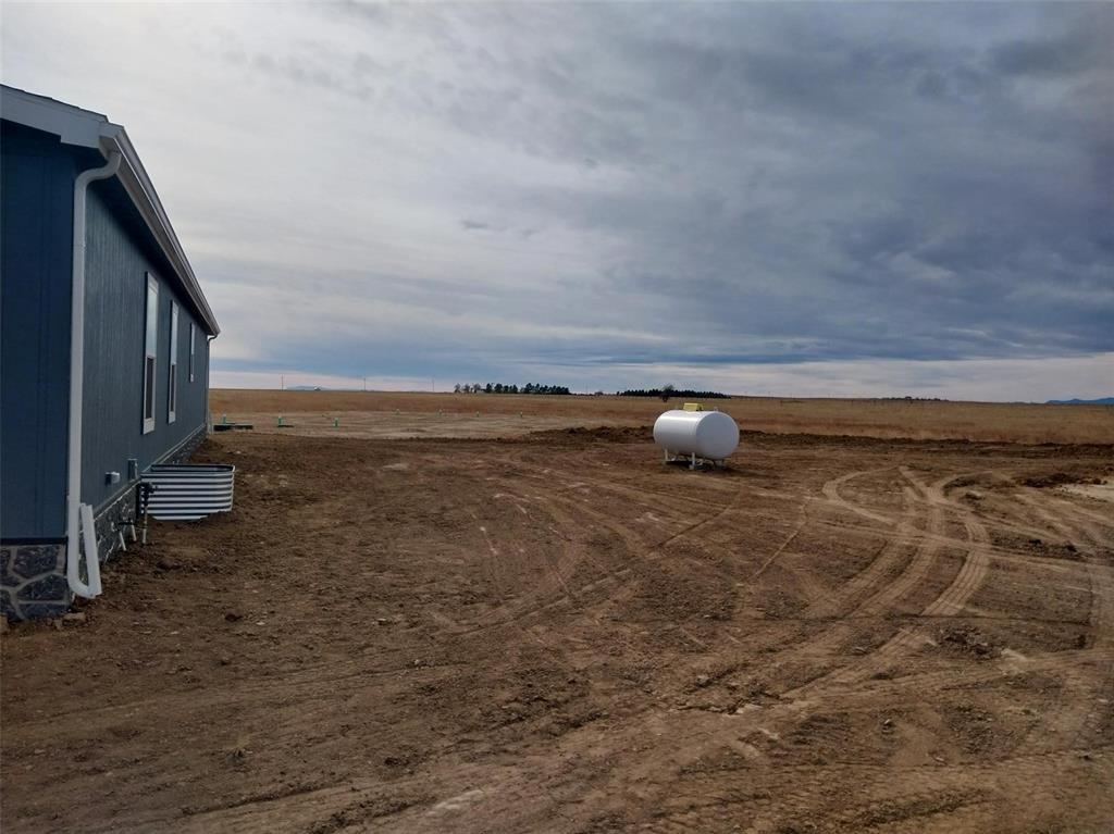 Image 17 of 25: View of yard with a view of rural / pastoral area