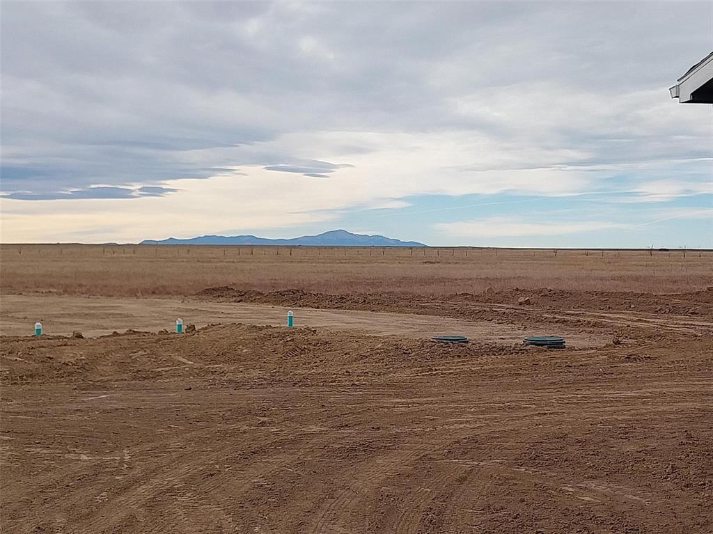 Image 19 of 25: View of mountain backdrop featuring rural landscape