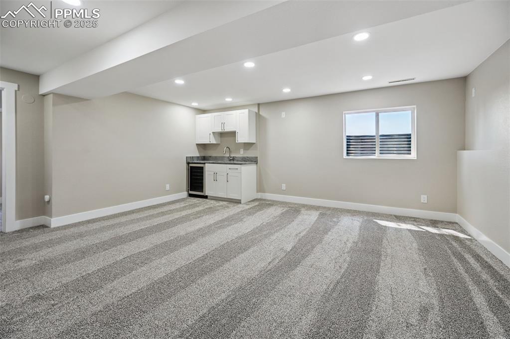 Image 27 of 45: Basement, Second Family Room, wet bar