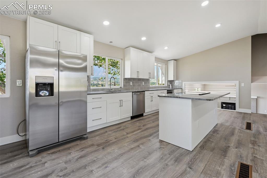 Image 9 of 45: Kitchen, SS Appliances. island