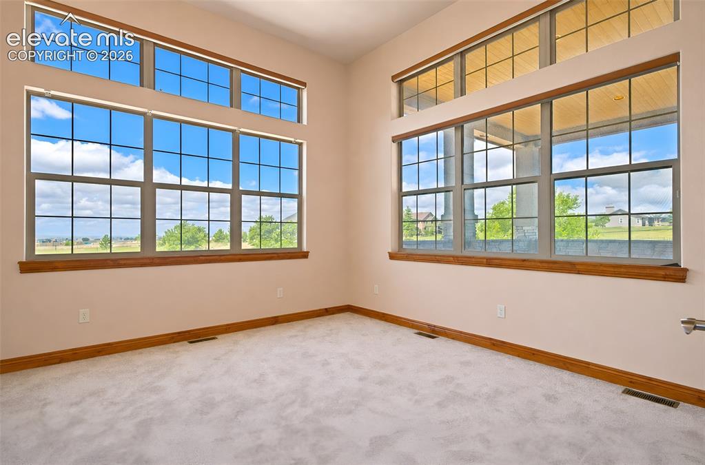 Image 10 of 48: Office with Pikes Peak views and new carpet