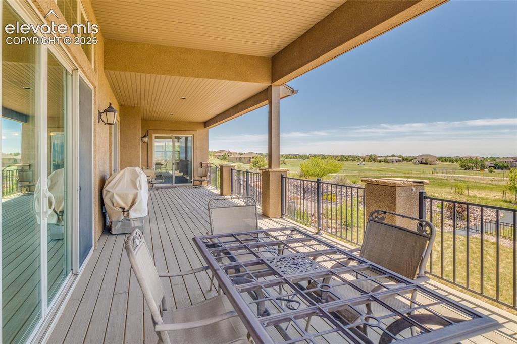 Image 18 of 48: Deck from great room walk out