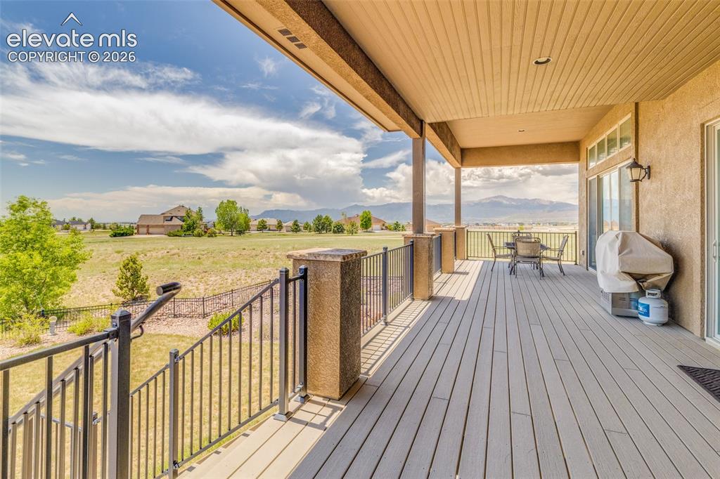 Image 19 of 48: Deck from great room walk out