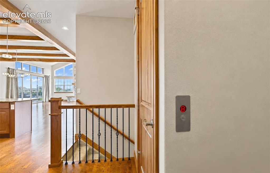 Image 32 of 48: Stairs to basement and elevator