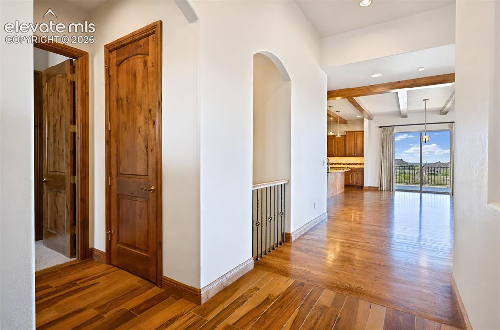 Image 7 of 48: At entry. Guest bedroom with en-suite 3/4 bath to the left and 1/2 guest ba