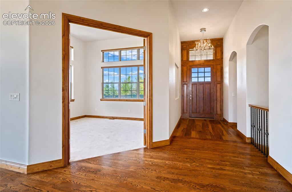 Image 8 of 48: Looking toward entry, office to the left