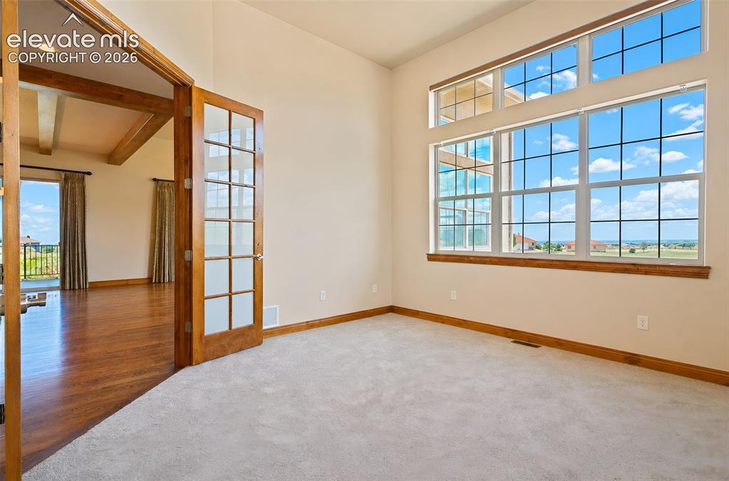Image 9 of 48: Office with Pikes Peak views and new carpet