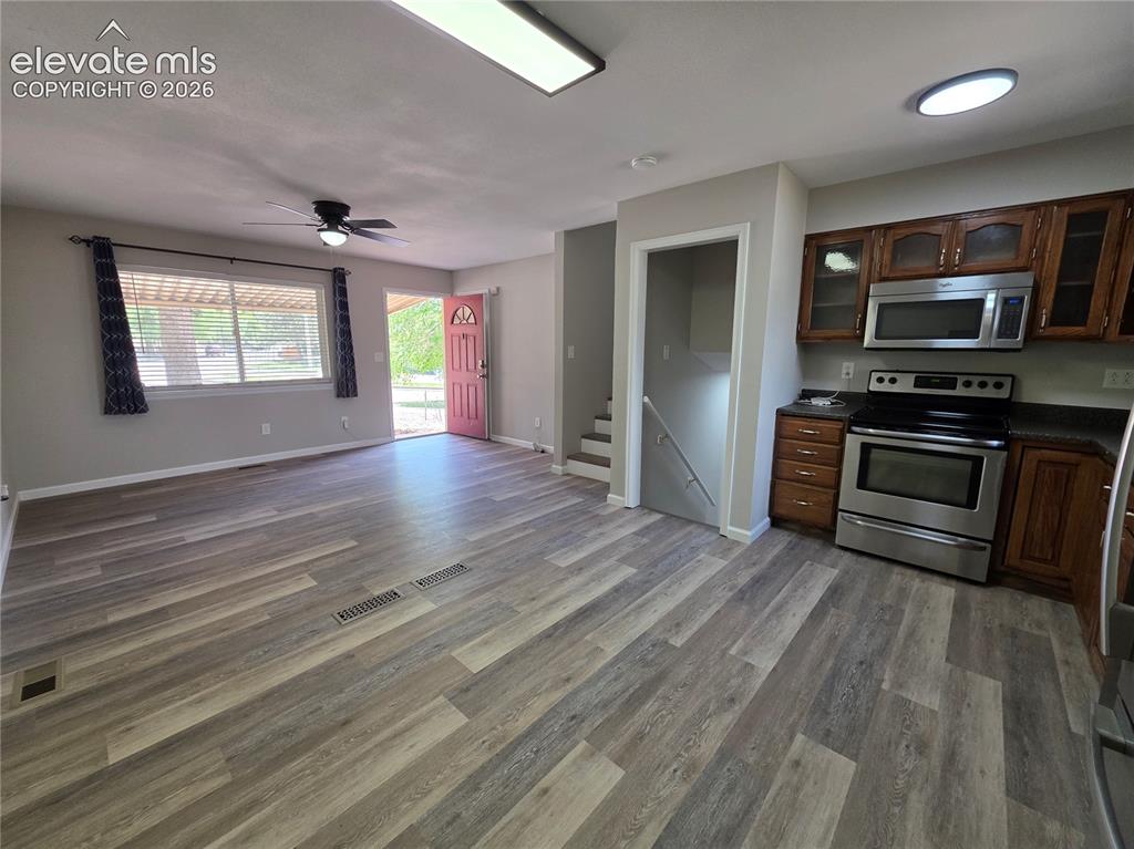 Image 6 of 18: Wood-finish flooring throughout the main level
