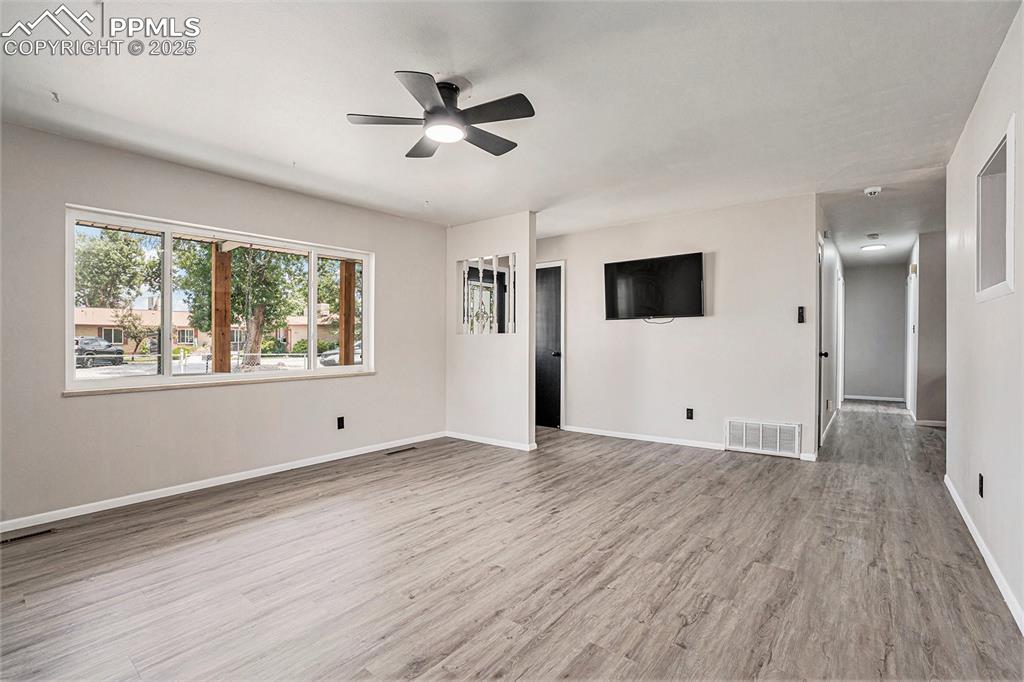 Image 9 of 35: Unfurnished living room.