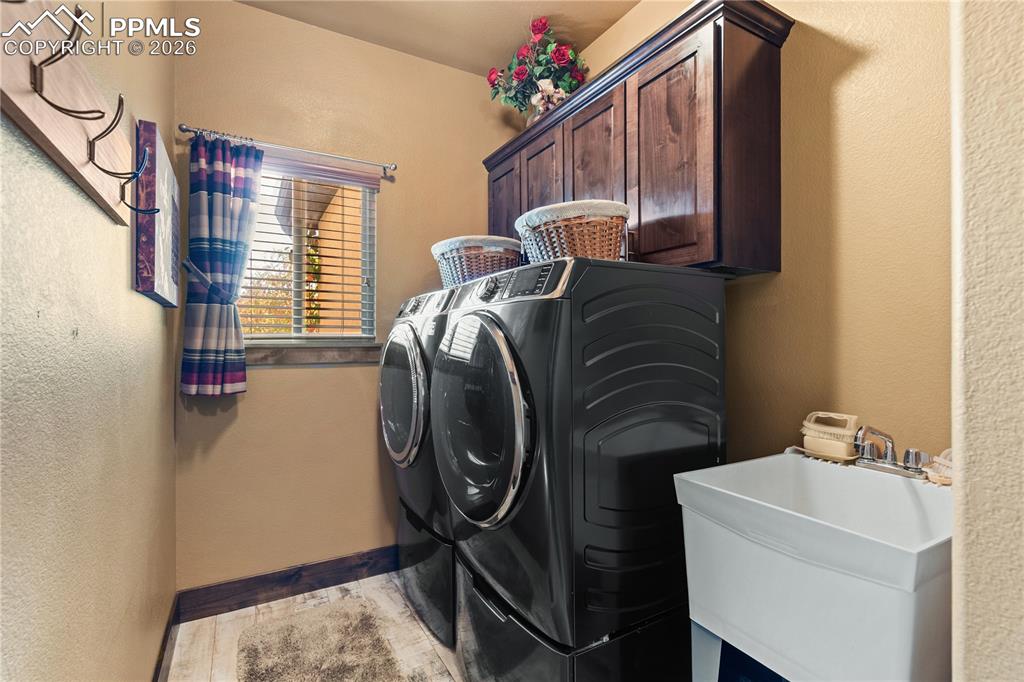 Image 18 of 36: On main with utility sink