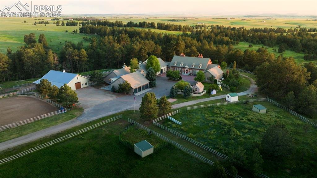 Image 31 of 49: Masterfully planned for daily life on the ranch, the estate’s layout connec