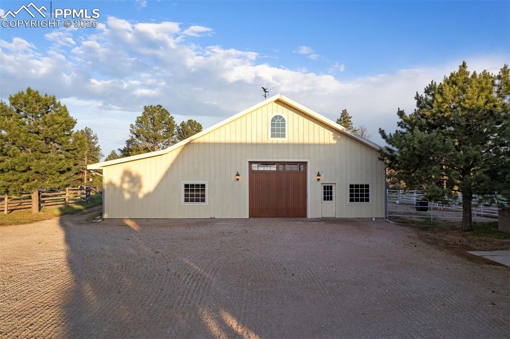 Image 40 of 49: Barn two is 3,600 sq. ft. and features and indoor round pen and four additi