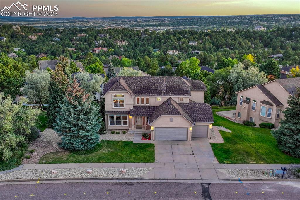 Image 48 of 50: Aerial front of home