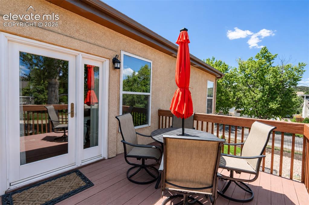 Image 19 of 50: Side deck off of kitchen