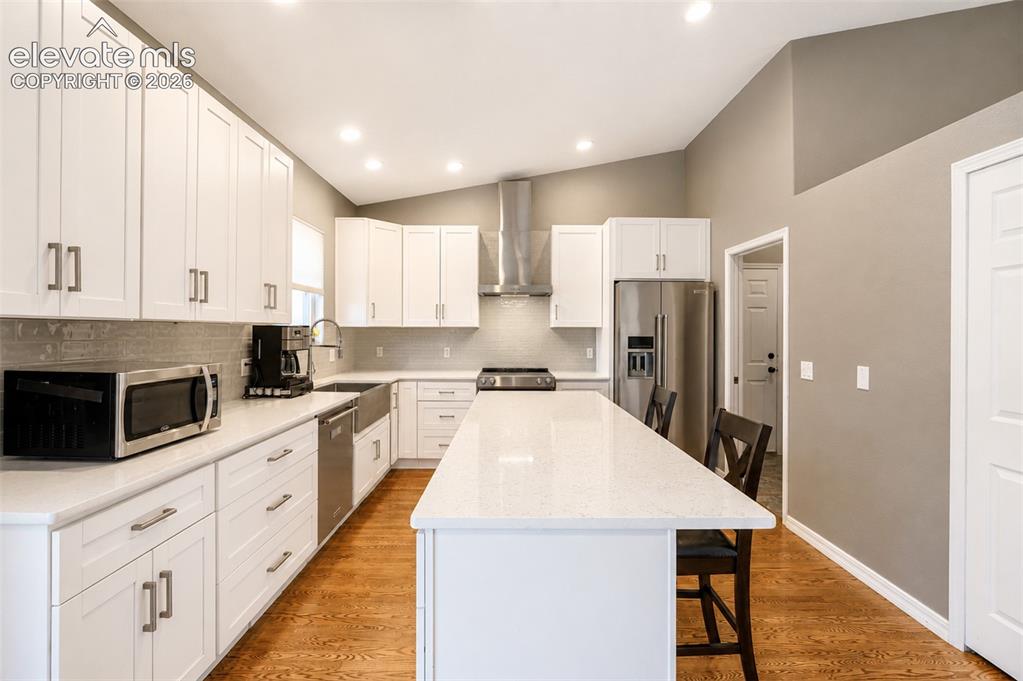 Image 21 of 50: Kitchen with pantry - main floor