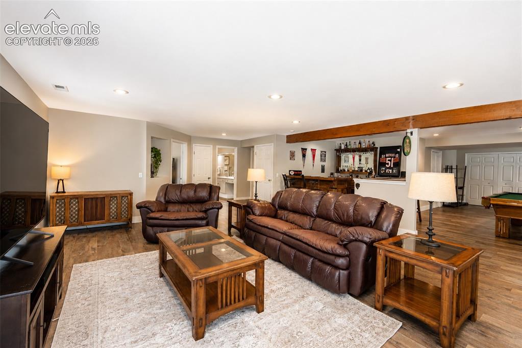 Image 26 of 50: Second living room with fireplace and walk out - basement