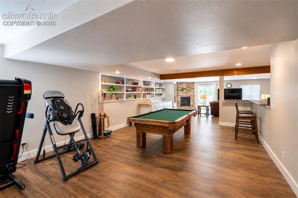 Image 30 of 50: Entertainment/game room - basement
