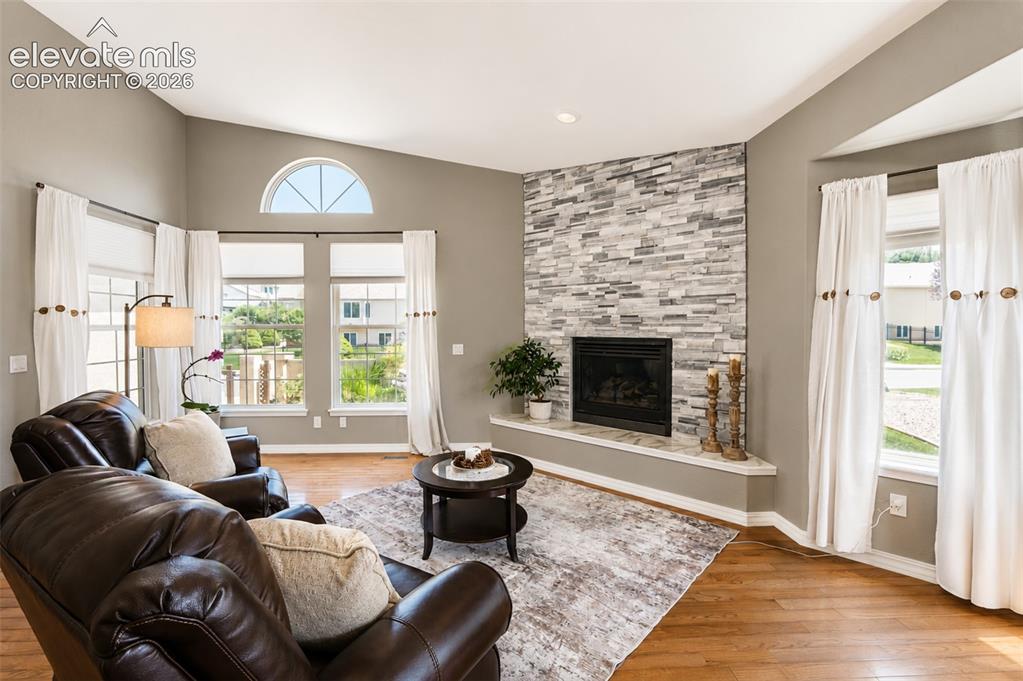 Image 4 of 50: Sitting room with fireplace - main floor
