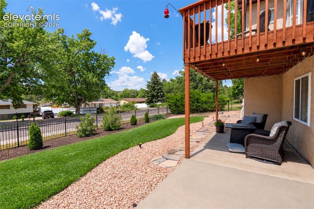 Image 42 of 50: Back yard/patio