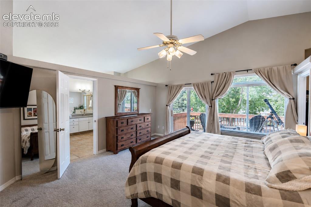 Image 8 of 50: Primary bedroom (1) with walk in closet, walk out balcony deck, and ensuite