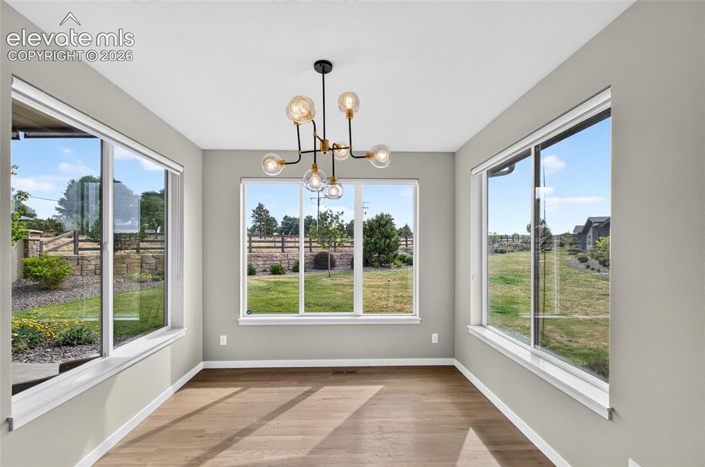 Image 12 of 50: Very bright dining room