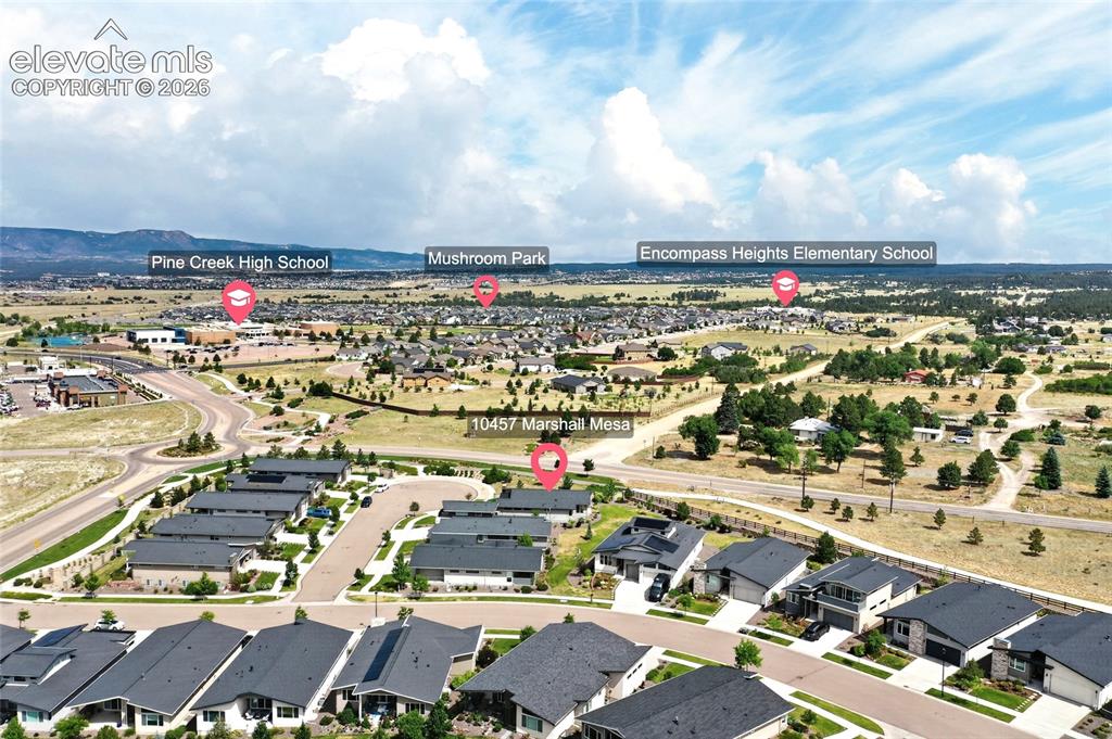 Image 48 of 50: Aerial perspective showcasing a residential community with contemporary hom