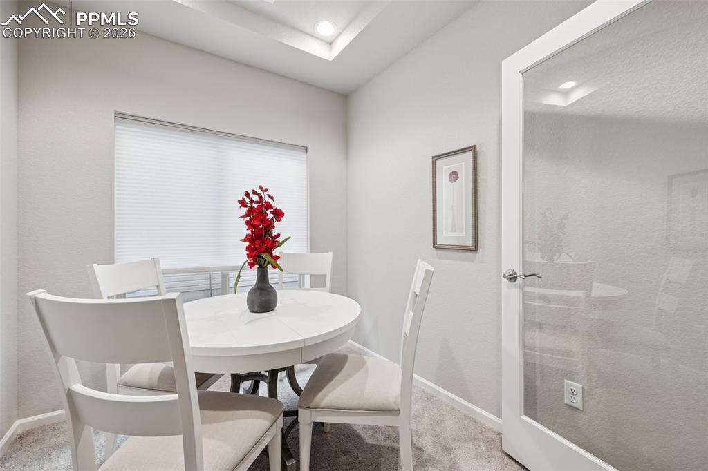 Image 11 of 32: Formal Dining Room with double door entry.
