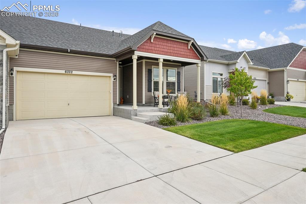 Image 3 of 32: Two car garage with storage space.
