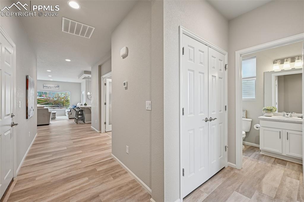 Image 6 of 32: Front Entry with  luxury vinyl flooring and neutral colors throughout.