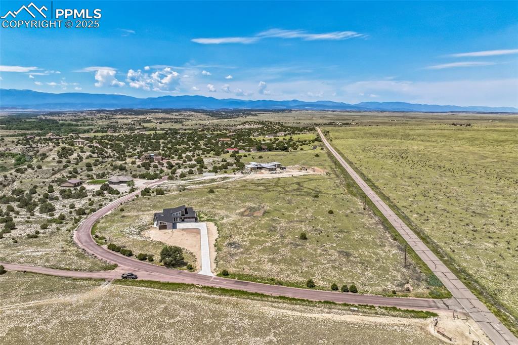 Image 44 of 50: Overview of rural landscape with mountains and a desert landscape