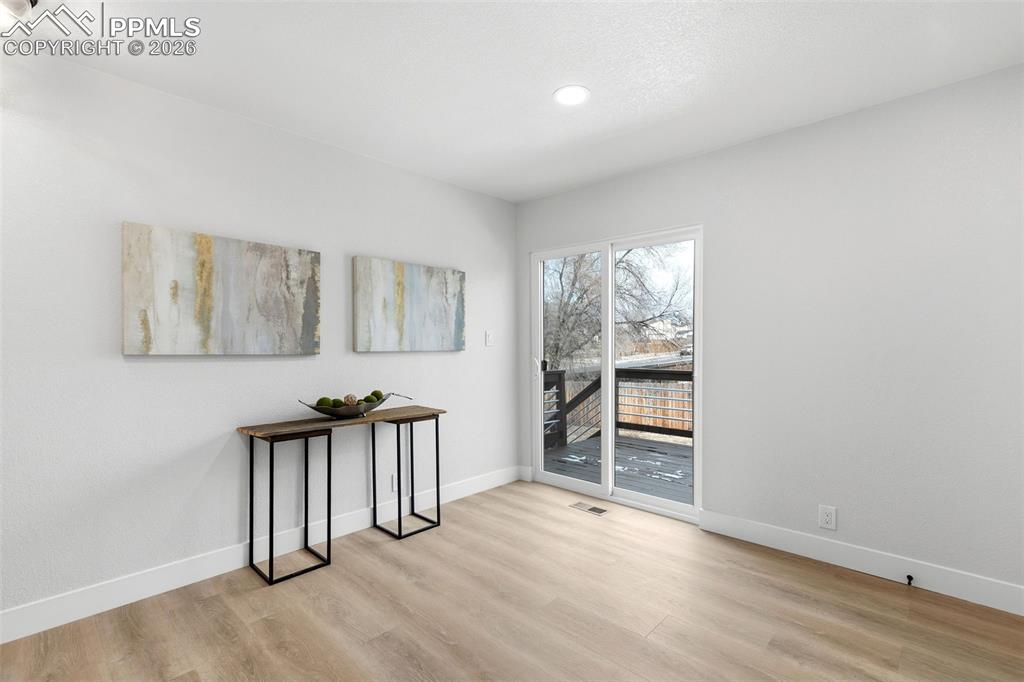 Image 13 of 32: Eat-in Kitchen with Walk-Out